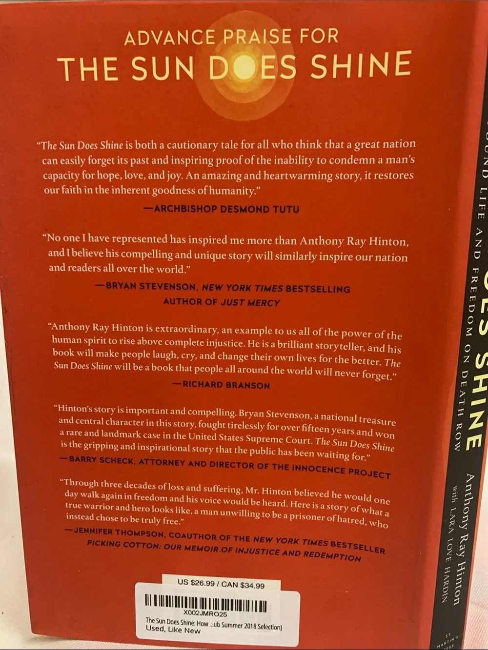 The Sun Does Shine by Anthony Ray Hinton — Orange Hardcover Book